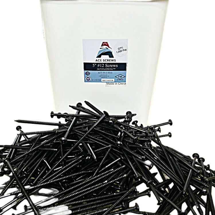 #12 SKINNYnSTRONG all-purpose roofing fasteners scattered near branded container, showcasing durability and FM approval.